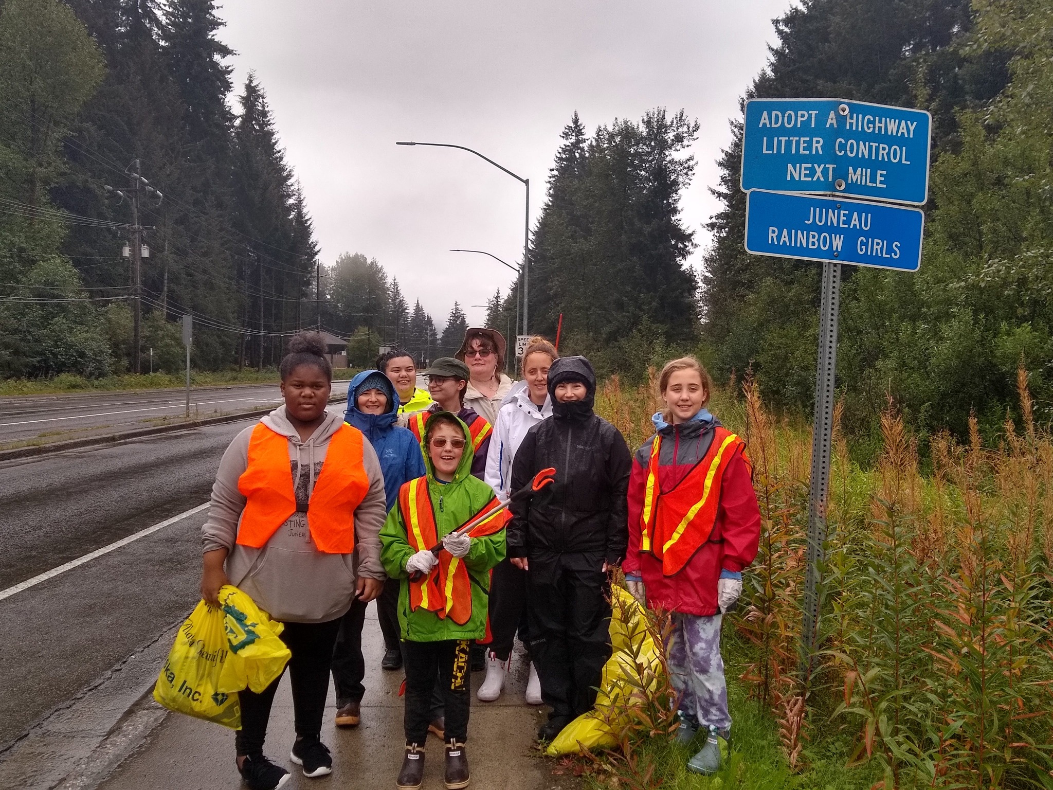 Juneau Rainbow Girls participating in Adopt a Highway roadside cleanup